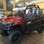 Red ATV cart parked inside Garrett's.