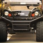 Black E-Z-GO golf cart front view.