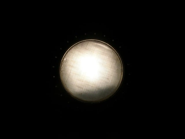 Gold cart headlight.