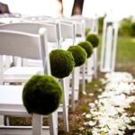 Wedding chairs on grass.