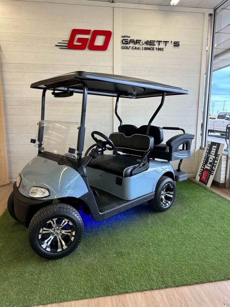 light blue golf cart with undercarriage lighting