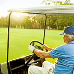 Senior man on a golf cart in a retirement community